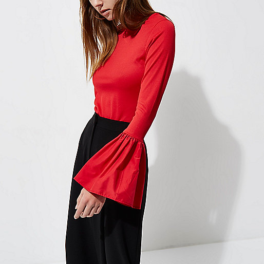 blue mid rise flared jeans river island,jacques-vertuk New Stock Red ribbed flared poplin cuff top Blouses Tops women